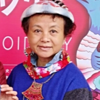 稍苞烏努老師（中國彝族）