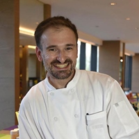 Nicholas Pena Alvarez CMC ( 葛艾睿 )