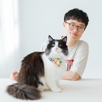 那堤與貓行為訓練師温温 