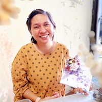 Esther 張何玉珍 老師